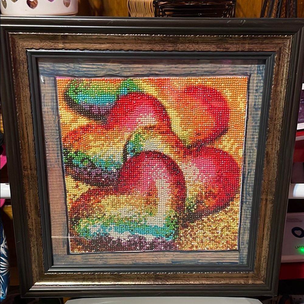 Vibrant Framed Art Piece with Red and Green Accents